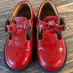 Adorable red Mary Jane style shoes with buckle closure. 23 wide.  US toddler 7.5
